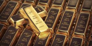 الذهب يتراجع بعد اقترابه من أعلى مستوى في 4 أسابيع مع صعود الدولار