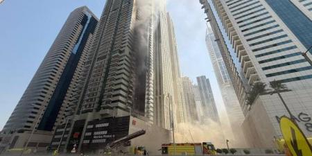 الدفاع المدني في دبي أخمد حريق برج المارينا وقام بإخلاء 3820 شخصاً