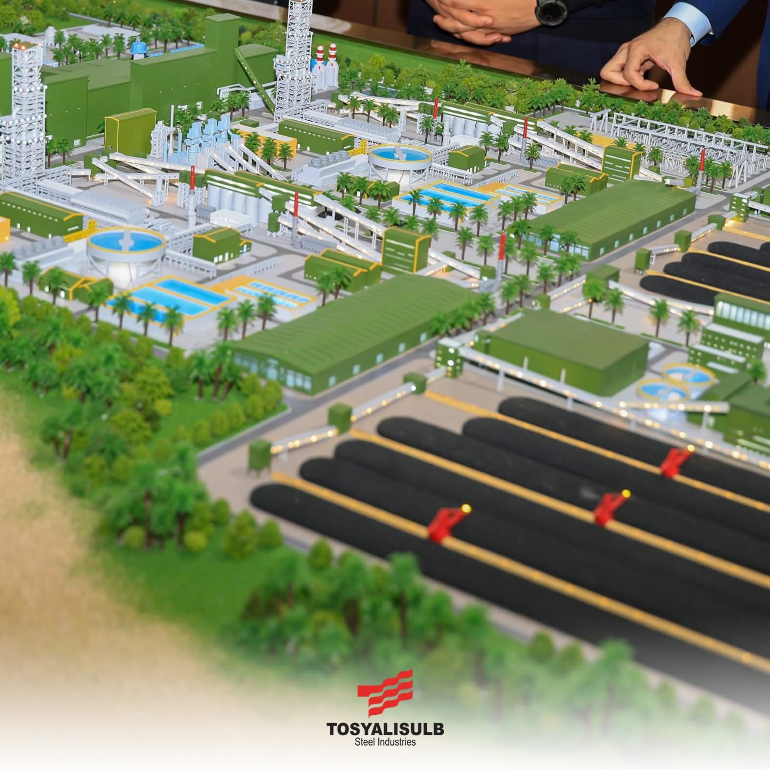 May be an image of ‎1 person and ‎text that says '‎عیی TOSYALISULB Sieel teelIndustries ndustries‎'‎‎