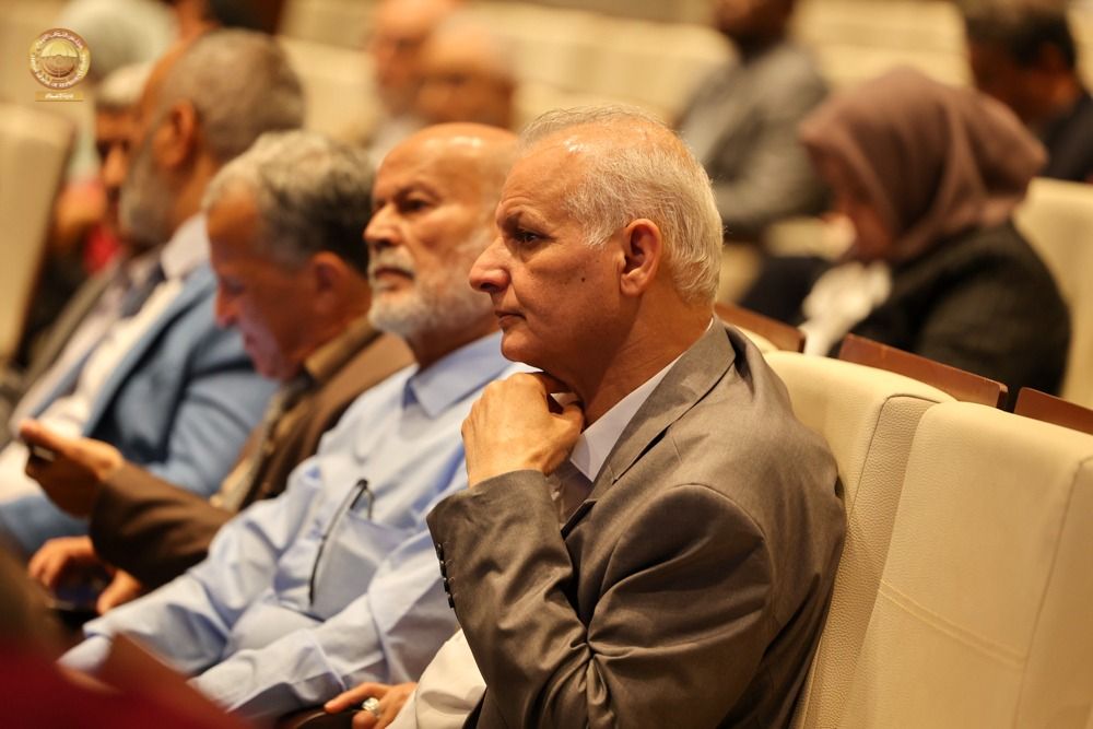May be an image of 2 people, people studying and dais