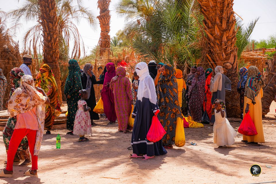 May be an image of 8 people and camel