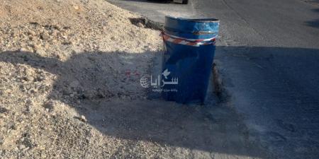 بالصور .. برميل زفتة مهمل منذ أسابيع يشكل خطرًا على السائقين قرب دوار الشهيد المجالي