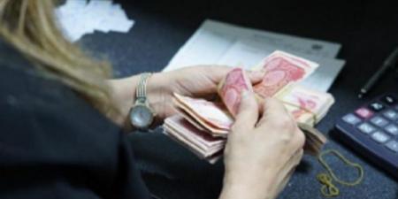 العراق يحظر الدفع النقدي في المؤسسات الحكومية الشهر المقبل