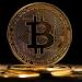 بيتكوين تتراجع الى ما دون 100 ألف دولار عقب الضربات الأمريكية على إيران