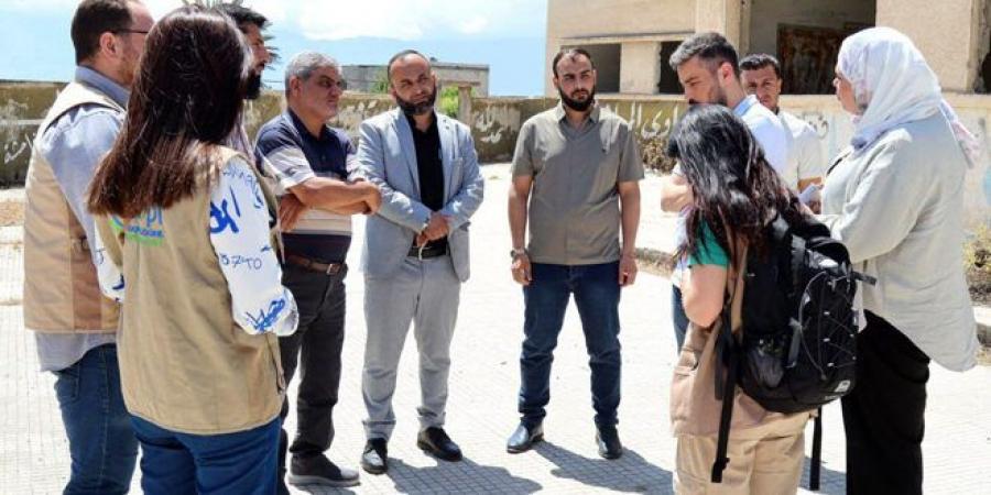 وفد من منظمة التعاون الدولي الإيطالي يزور مدارس قلعة المضيق في ريف حماة
