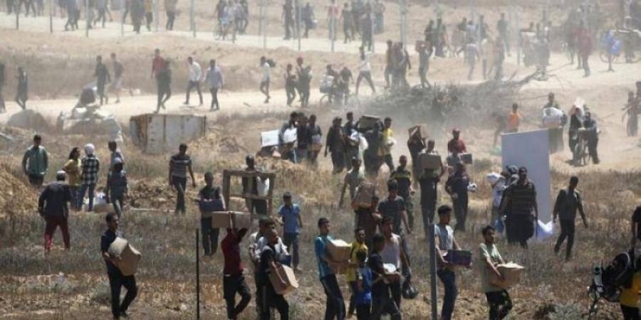 إسرائيل توزِّع شهادات الموت على الأحياء ومراكز المساعدات